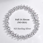 Silver necklace with zircon stones on a white background