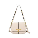 White handbag with gold accents on a white background