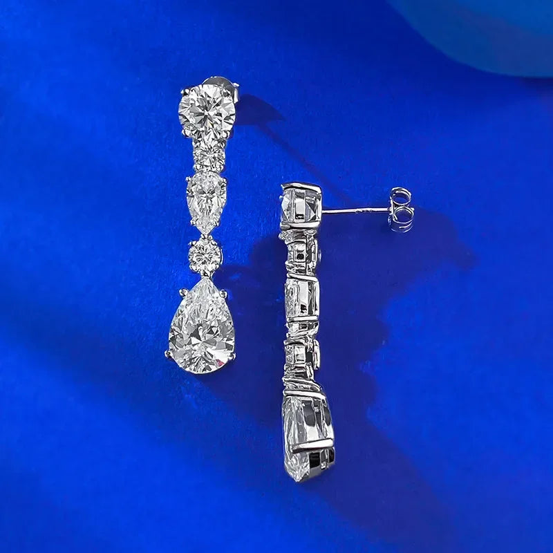 Diamond earrings on a blue background