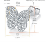 Butterfly-shaped silver earring with diamond-like stones, showing measurements on a white background.