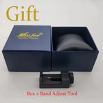 Blue gift box with 'Miss fox' branding, containing a black object, and a black band adjust tool on a white background.
