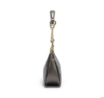 Black handbag with gold chain strap on a white background