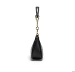 Black handbag with a gold chain on a white background