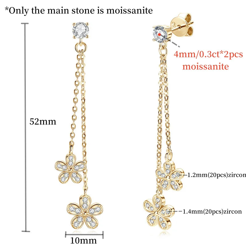 Gold earrings with floral designs and gemstones, shown with measurements.