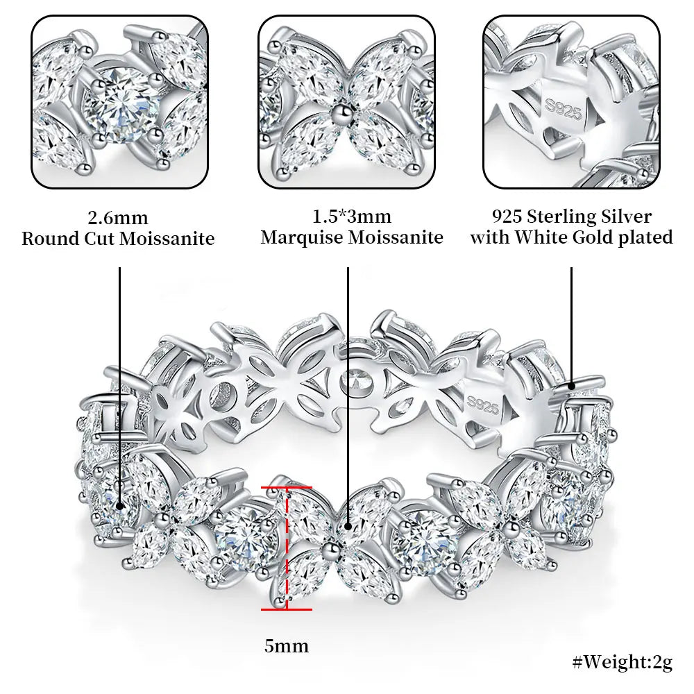 Butterfly-shaped silver ring with marquise and round cut moissanite stones, featuring detailed specifications.