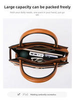 Brown handbag with items inside on a white background